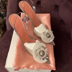 Amina muaddi begum pump.